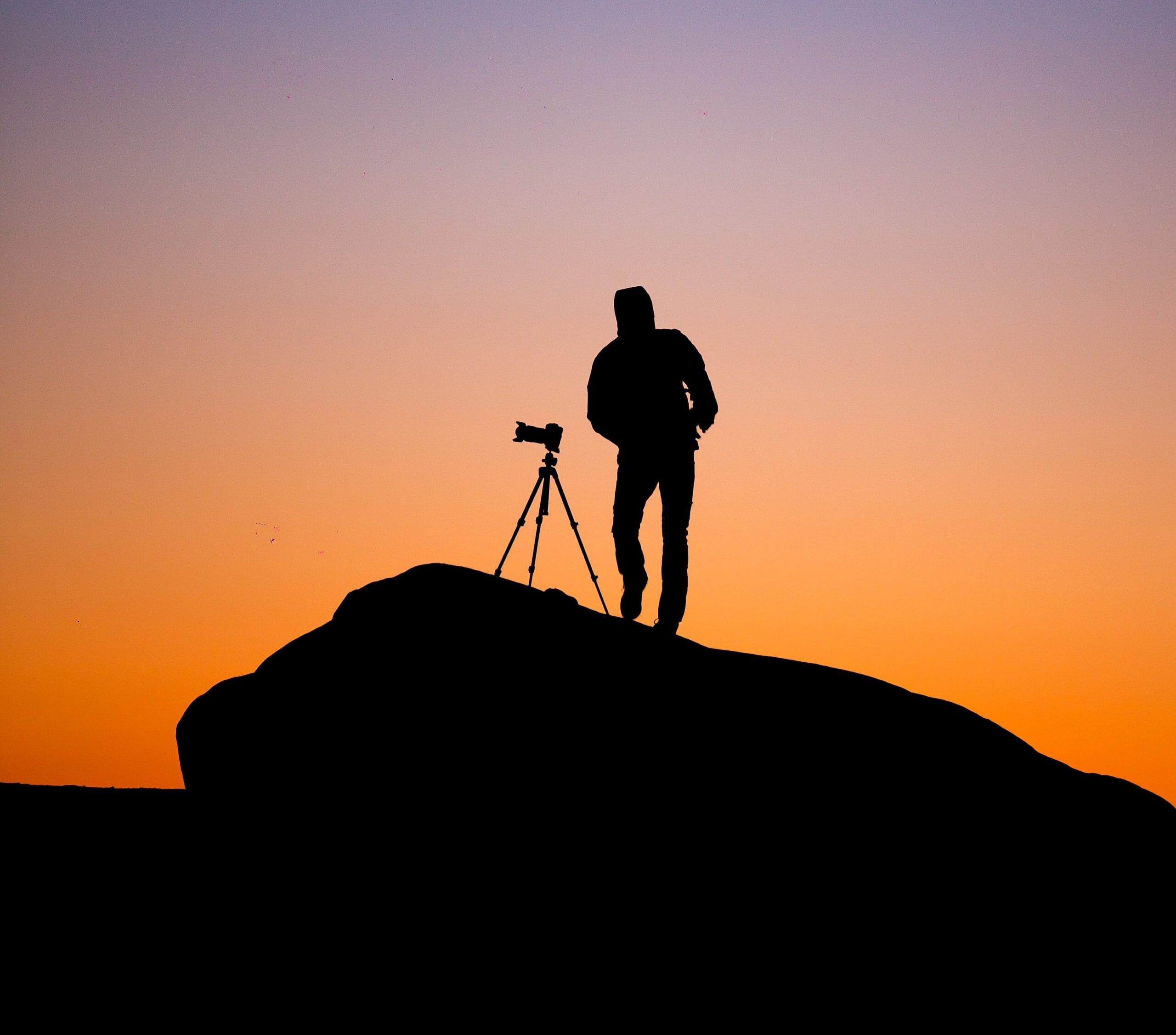 Traveling Photographer with Tripod